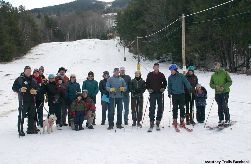 Volunteers in front of the rope tow